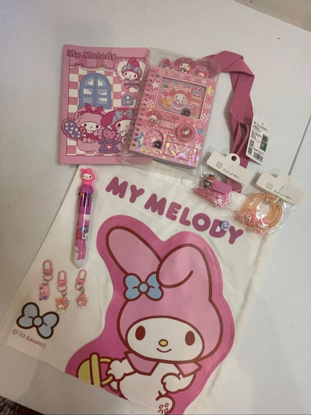 My Melody tote bag stocking stuffers kit bundle Sanrio pens, hair ties, key chai